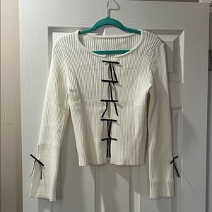 White Ribbed Sweater with Black Bow Accents